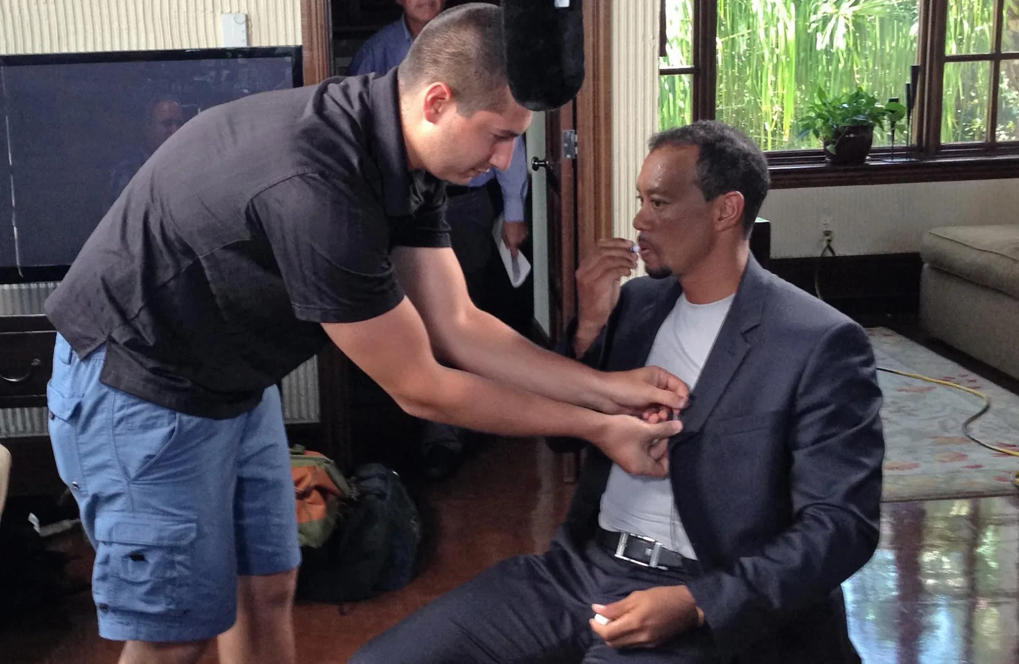 Miking a documentary interview subject on location